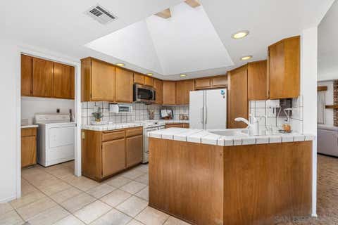 Photo of 12450 Algonquin Rd RD, Apple Valley, CA 92308 (MLS # 260015834SD)