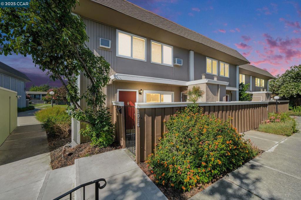Stylish End-Unit Townhome in Prime Colony Park Location! This spacious 2-story home offers peace and privacy at the back of the complex with serene greenbelt views. Inside, enjoy a beautifully updated kitchen, rich wood flooring, dual-pane windows, recessed lighting, crown molding, and tasteful neutral tones throughout. Thoughtful features like ceiling fans, two private patios, and a primary suite with a private deck overlooking the pool and greenery make this home both comfortable and inviting. A rare end-unit opportunity in an excellent community — Don’t miss it!