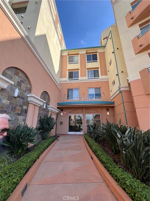 Photo of 580 W Main St #122, Alhambra, CA 91801 (MLS # IV26066182)