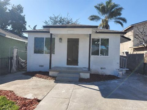 Photo of 15211 S Gibson Ave, Compton, CA 90221 (MLS # DW26037332)