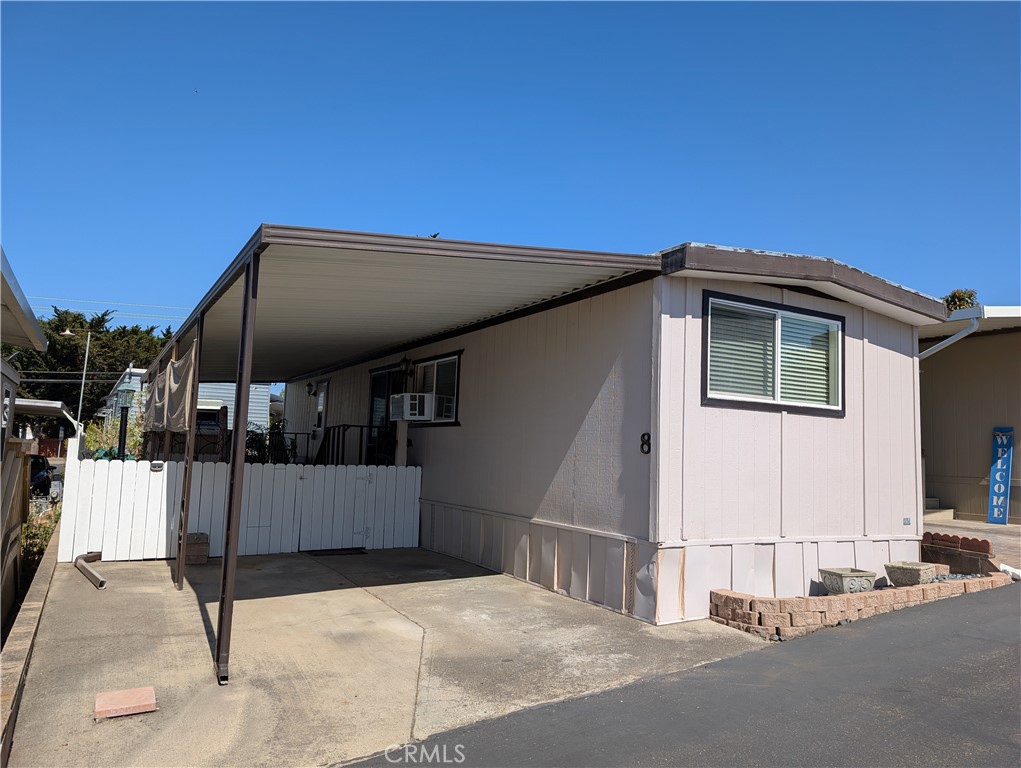 You don’t want to miss this opportunity! Hurry on over to view this well-cared for home - just minutes from the beach. This cozy home is in an all age neighborhood, and affordable space rent only $329 for all new buyers. Additionally, home is located in a a rent-controlled park. This well kept home is as clean as they come. It also comes with washer/dryer, fridge and a window a/c unit. The floor plan is open and spacious to maximize the living space. As a bonus to the home, it also comes with an adorable fenced and covered patio as well as a storage shed!! There is also updated laminate flooring throughout, bathroom has a step-in shower and newer vanity. This adorable beach home is centrally located to shopping, restaurants, schools and parks. It won’t last long. Come check out this great home in a highly sought out coastal neighborhood. Termite report availabe. Ask for park application and rules. Call for your own private viewing and see all that the home offers.