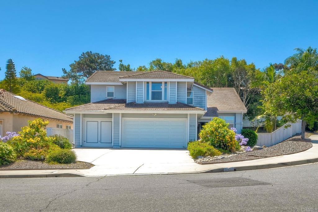 A Hidden Gem in San Marcos! Priced to sell and full of potential, this charming two-story home offers the perfect opportunity to plant roots in one of San Marcos' most desirable neighborhoods, The Laurels — and best of all, there’s no HOA to worry about! Situated on a large corner lot, this property gives you room to grow. Whether you dream of a lush garden, a pool, or an entertaining space, the possibilities are endless. Step inside to find a bright and welcoming layout, full of natural light and two comfortable living areas perfect for relaxing or entertaining. The kitchen features Saltillo tile floors and lots of windows that look out of the backyard. The primary bedroom features an ensuite bathroom with travertine shower and floors and a large walk-in closet. Three additional bedrooms and a large second full bath complete the upstairs. The home features a 3 car garage and ample storage space. With a little TLC, this home is ready to shine and become your personalized haven. Nestled in a quiet, established neighborhood right on the border of Carlsbad, you’ll enjoy peaceful surroundings while being just minutes from top-rated schools, parks, walking and hiking trails, shopping, and all that San Marcos has to offer.
