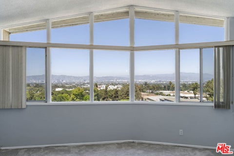 Photo of 4749 Don Ricardo Drive, Los Angeles, CA 90008 (MLS # 26876721)