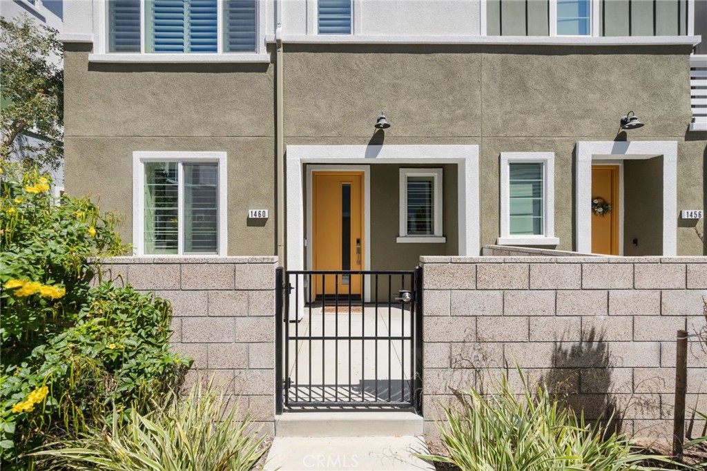 Welcome to this modern three-story residence in the heart of San Pedro, offering style, functionality, and comfort at every turn. As you enter this spacious end unit, you’re greeted by a private front patio that sets the tone for relaxed living. The entry-level features a spacious bedroom with its own full bathroom, perfect for guests or a private office. On the second floor, you’ll find an open-concept living, dining, and kitchen area flooded with natural light. Light-colored floors, recessed lighting, and a seamless layout create a warm, inviting atmosphere. The gourmet kitchen is a chef’s dream, showcasing white cabinetry, sleek black quartz countertops, stainless steel appliances, and a large eat-in island ideal for gatherings. Enjoy the sunny weather from the balcony to enjoy fresh air and neighborhood views. The top floor is home to the expansive primary suite, complete with an en suite bathroom featuring dual sinks and a large glass-enclosed shower. Also upstairs are two additional bedrooms, a full guest bathroom, and a convenient laundry area. Additional highlights include an attached two-car garage for easy parking and storage, paid of solar panels, upgraded plantation shutters and central A/C and Heat. Community features a pool and outdoor spaces. This stunning home combines contemporary design with everyday functionality—perfect for anyone seeking the best of coastal living in San Pedro!