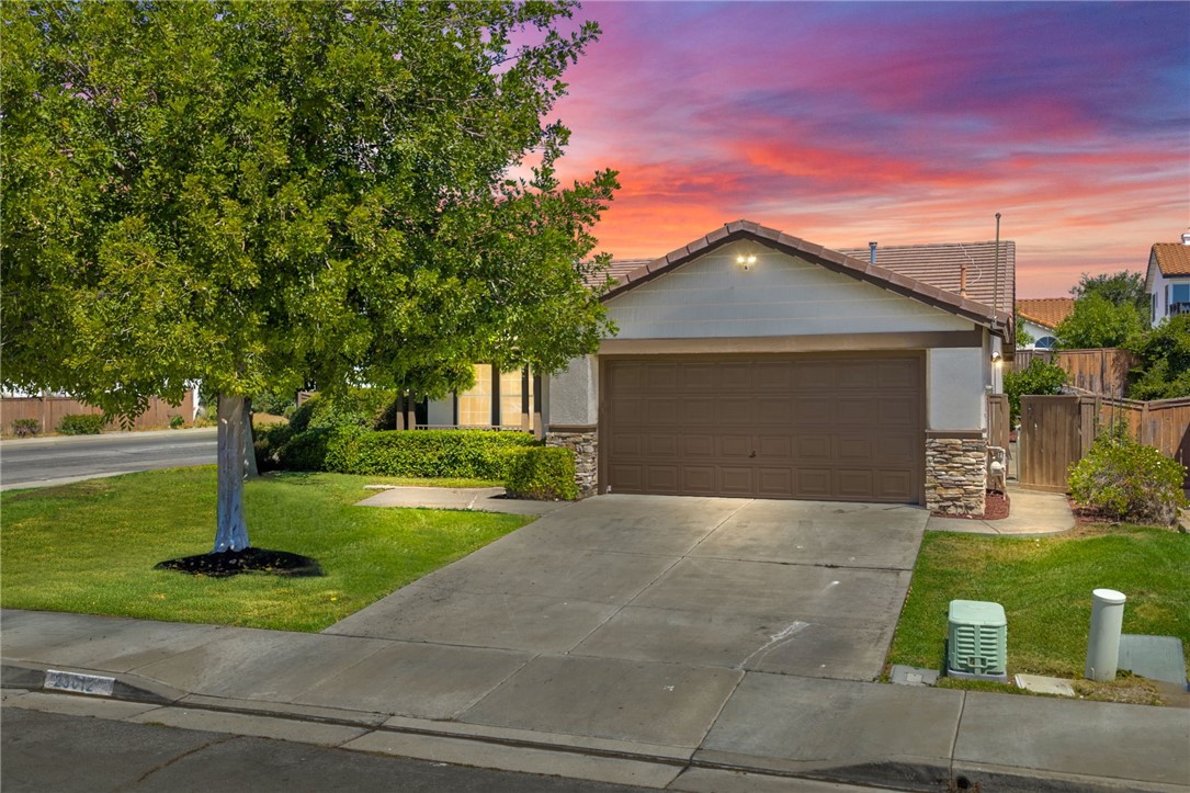 SINGLE-STORY CORNER LOT GEM ~ FRESHLY PAINTED INTERIOR! Perfectly located near shopping, dining, schools, and quick 15-Freeway access, this charming 3-bedroom home is move-in ready. Picture yourself sipping morning coffee on the covered porch while enjoying peaceful mountain views in the distance. Inside, you’ll find fresh interior paint and a spotless, just deep cleaned interior. Easy-care laminate and tile flooring flow throughout, creating a bright and inviting space. The formal living and dining areas sit at the front of the home, while the kitchen and family room open to the backyard. The kitchen shines with crisp white cabinetry, updated gold hardware, a farmhouse sink, roomy pantry, and plenty of counter space—including the perfect spot for a breakfast nook overlooking the backyard. The cozy fireplace in the family room will be your favorite gathering place on cool fall evenings. The primary suite includes a walk-in closet and dual sinks, while two secondary bedrooms share a full bathroom. A versatile indoor laundry room can double as a home office or extra storage, with additional hookups also available in the garage. Step outside to a private backyard featuring a spacious patio, citrus trees, and fresh mulch—an ideal retreat for outdoor entertaining or simply unwinding. This home has it all—style, convenience, and comfort. Don’t miss your chance to make it yours. Schedule your private showing today!