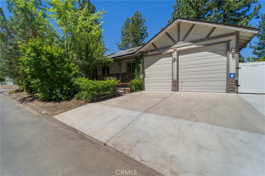 Experience the perfect Big Bear Lake escape in this spacious, recently renovated 2,600 sq ft mountain cabin with 800 sq ft 12-foot ceiling game and movie room! Nestled in one of the area’s best neighborhoods, Fox Farm, this retreat combines rustic charm with modern comfort and is just minutes from ski slopes, the lake, the zoo, and local shops and dining.
Step inside and feel right at home in the open living spaces designed for families and friends to gather and relax. Large windows bring in mountain light while a cozy wood burning stove and entertainment setup make evenings together special. The separate game and movie room with 6-person sauna offers endless ways to unwind, whether it’s movie nights, games, or simply spending time together.
Out back, you’ll find a fully fenced yard where kids and pets can play freely, plus a relaxing hot tub and firepit that make stargazing nights unforgettable. The backyard also features space for outdoor cooking and dining, making it easy to share meals and create memories in the fresh mountain air.
Families are especially welcome here — thoughtful touches throughout make it easy to travel with kids and pets alike. An EV charger and eco-friendly water filtration add to the cabin’s modern convenience, while plenty of parking and easy access to town keep your stay simple and stress-free. New solar system was installed in 2022.
Whether you’re hitting the slopes, exploring the lake, or just relaxing in the sauna after a day of adventure, this cabin offers the perfect balance of mountain comfort and fun. Gather, connect, and create memories in a place designed to feel like your own private Big Bear hideaway.