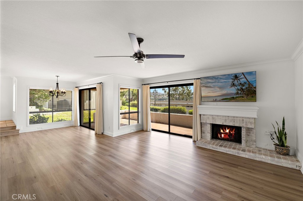 Welcome to the Mallorca’s! Lake Mission Viejo living at its finest with private beach, boat and fishing docks, 2 pools and lake side cabana all within a 24/7 guarded gated community. Hardwood flooring throughout the main living area with upgraded baseboards, door and window casing, crown molding, and raised panel doors. An abundant of windows surround the living room, formal and casual dining rooms with two sliding glass doors that open to the spacious patio perfect for relaxing or alfresco dining. Kitchen features white cabinetry and stainless steel appliances that overlook the living area and patio. Large primary bedroom with upgraded vanity and tiled shower with glass enclosure. Secondary bedroom with new carpet and upgraded guest bath complete the home. Newer HVAC and water heater. Enjoy this gem while living in what feels like a resort vacation community and all that Lake Mission Viejo has to offer to include boat rentals, summer concerts, fireworks and more!