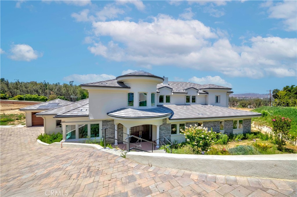 Brand-New Luxury Estate for Lease in Exclusive Cowan Heights – Private Gated Entry & Stunning Mountain Views
Be the first to live in this newly built custom luxury estate located in the prestigious Cowan Heights community. This expansive 6,080sqft residence features 6 spacious bedrooms and 6.5 bathrooms, all set on a nearly half-acre flat lot with breathtaking snow-capped mountain views.
Enjoy ultimate privacy behind a secure private gate. The open-concept layout offers soaring ceilings, natural light, and seamless indoor-outdoor flow. The chef’s kitchen is outfitted with top-of-the-line Miele appliances, sleek custom cabinetry, and an oversized waterfall island, plus a separate prep kitchen—ideal for entertaining. The luxurious primary suite boasts panoramic views, spa-like bath, and a custom walk-in closet. Each additional bedroom includes its own en-suite bath. Ample space available for a wine cellar or home theater. Outdoor patios and manicured grounds provide elegant spaces for relaxing and al fresco dining. Experience refined living in one of Orange County’s most sought-after neighborhoods. Available now for lease—contact us for a private showing.