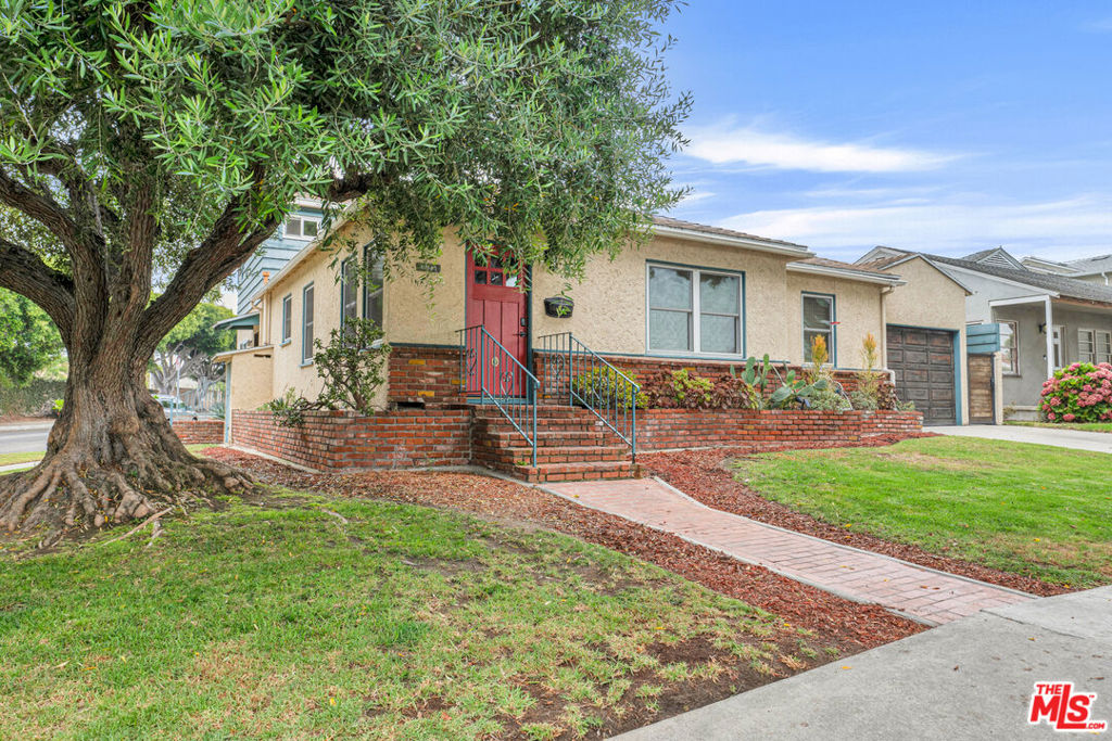Nestled on a serene, tree-lined street, this beautiful 3 bedroom, 2 and 1/2 bath residence is filled with classic character. Situated on a spacious corner lot directly across from a lovely community park and playground, and walking distance to a highly regarded elementary school, the home provides an ideal setting for families and professionals alike. Always plenty of free street parking makes coming home a breeze, while large shade trees surrounding the property keep the house cool all year long, even in the height of summer. Step inside to discover rich hardwood floors and custom wooden shutters that set a warm, inviting tone throughout the home. The updated kitchen features sleek granite countertops, contemporary appliances, and a thoughtful layout that opens seamlessly to the living and dining areas, perfect for entertaining. The home boasts recessed lighting, a wood-burning fireplace, central air conditioning and heat, and an abundance of storage space. The second-floor primary suite offers a tranquil retreat, complete with generous proportions and thoughtful design. Outside, enjoy sunny afternoons by the sparkling outdoor pool or relax in the privacy of your fenced backyard. An attached garage provides added convenience and functionality. Combining location, luxury, and lifestyle, this residence is a rare find in one of the area's most desirable neighborhoods.