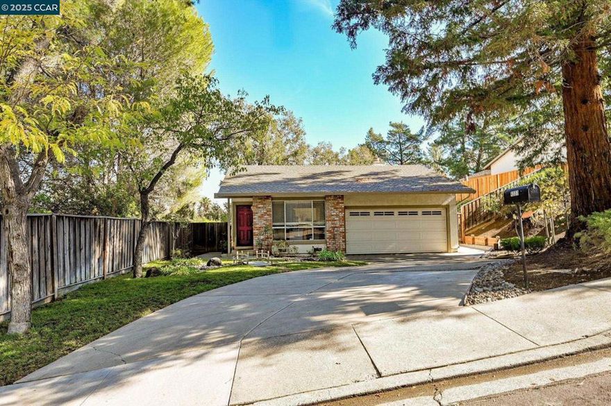 Darling single-story home in highly sought-after Turtle Creek! This charming four-bedroom, two-bath home offers the perfect blend of comfort and convenience. Step inside from the beautifully maintained front yard to a bright, inviting living space with soaring vaulted ceilings and abundant natural light. The formal living and dining rooms flow seamlessly into the open kitchen and cozy family room, complete with a fireplace—ideal for relaxing or entertaining. The spacious primary suite features an ensuite bath, while two additional bedrooms and a full hall bath provide room for family, guests, or a home office. Enjoy indoor-outdoor living in the wonderful backyard with a deck, lower patio, and lush landscaping—perfect for gatherings or quiet evenings under the stars. Fresh interior paint, new carpet, and some updated lighting and hardware add a fresh, move-in-ready feel. Nestled between Lime Ridge Open Space and Newhall Community Park, and just minutes to Safeway, Whole Foods, and great restaurants—this home truly has it all. A must-see, ready for its new owners!