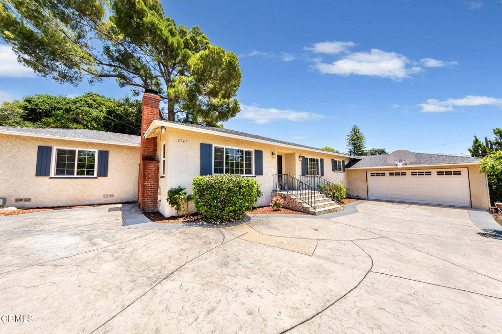 Welcome to 2767 Brookhill Street, an outstanding single-story home on a private, gated, expansive 10,813 sq ft lot in the sought-after La Crescenta-Montrose neighborhood. This captivating 3-bedroom, 2-bathroom residence features 1,781 sq ft of thoughtfully designed living space, combining comfort with modern elegance.As you enter, you'll be greeted by a spacious living room with hardwood floors, recessed lighting, and a cozy fireplace. The updated kitchen is a chef's dream, showcasing modern cabinetry, stainless steel appliances, granite countertops, and a large island that seamlessly connects to the family room and a formal dining room--perfect for entertaining.The property features central heating and air conditioning, and a convenient laundry area equipped with a stackable washer and dryer. The expansive backyard, complete with a large cement patio, is ideal for gatherings, gardening, or relaxation. Enjoy the fruits of the orange tree, avocado, mango, pomegranate, apples, figs, pears, lime, and lemons!With a finished, attached two-car garage and ample driveway parking, convenience is a key aspect. Located north of the 210 freeway, you'll have easy access to parks, hiking trails, shops, and top-rated schools like Monte Vista Elementary and Crescenta Valley High. Don't miss this incredible opportunity to own a move-in-ready home in a welcoming and established community.
