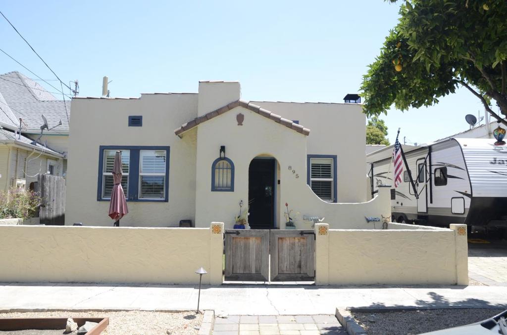 New Price:: Welcome to this charming 3-bedroom, 2-bathroom home located in the vibrant city of Hollister. With a generous 1,416 sq. ft. of living space, this property features a modern kitchen equipped with granite countertops, a gas oven range, dishwasher, and refrigerator, perfect for culinary enthusiasts. The home boasts a diverse array of flooring, including tile, wood, and vinyl/linoleum, offering both style and durability. Enjoy cozy evenings by the fireplace in the separate family room. Laundry facilities are conveniently located in the garage, with electricity hookups (220V) available. Additionally, the garage offers space for one vehicle and includes an electric vehicle hookup level 2 (240 volts). The property falls within the Hollister Elementary School District. With central AC and forced air heating, comfort is assured year-round. This home is situated on a 3,825 sq. ft. lot, blending functionality and style in a welcoming community.