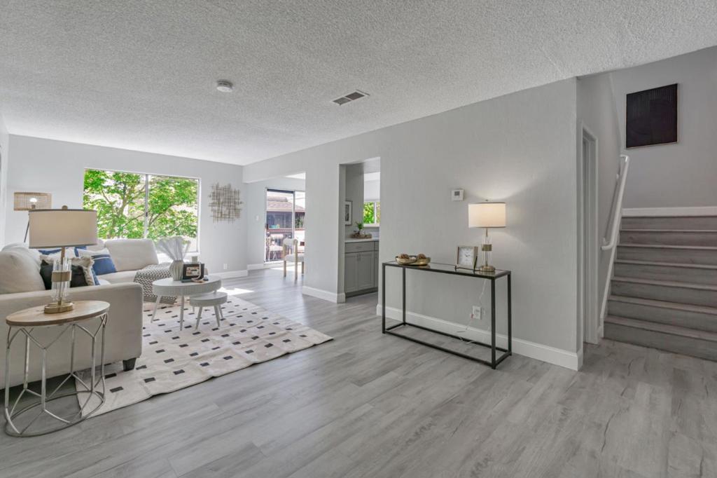 Stylishly renovated 2-bed, 1.5-bath condo just minutes from Todos Santos Plaza, Downtown Concord, BART, and Costco. This turnkey home features new flooring, fresh paint, and a fully remodeled kitchen with stainless steel appliances and sleek finishes. Enjoy a modern bathroom, dual-pane windows, A/C, and a private patio. Includes carport parking, storage, access to a pool, and community laundry. Seller is willing to pay 5 months of HOA dues in advancea great added value for buyers. Perfect for first-time buyers, downsizers, or investors. Don't miss this move-in-ready gem in a prime Concord location!