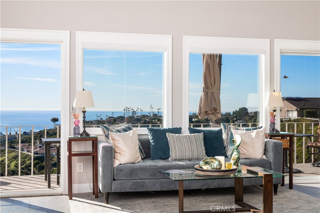 Stunning Ocean-View Hilltop Home for Lease | Detached Single-Level Residence with Panoramic Coastal Views
Experience coastal living at its finest in this rare, detached single-level home offering unparalleled 180-degree ocean and city light views extending all the way to Dana Point. Perched atop the prestigious Pacific Island Village community, this beautifully remodeled residence invites you to relax in the tranquility of hilltop breezes and breathtaking, unobstructed vistas visible from the living room, dining room, kitchen, and expansive rear deck.
Inside, the home has been thoughtfully upgraded with modern amenities for comfort and convenience. The spacious floor plan features wood-look porcelain tile flooring throughout—stylish, durable, and pet-friendly. A cozy natural gas fireplace anchors the living room, perfectly complementing the serene views beyond.
The chef’s kitchen is a showstopper, boasting a large island with a built-in wine/beverage fridge, high-end appliances including a French door refrigerator, 5-burner gas cooktop, oven, microwave, and a vented exhaust hood. Thoughtful additions like slide-out pantry shelves and corner cabinet organizers make cooking and entertaining effortless.
The primary suite offers a luxurious retreat, complete with an en-suite spa-style bath featuring a freestanding soaking tub, illuminated mirrors, linen cabinet. Both bathrooms feature curbless walk-in showers, a Toto automated bidet toilet, heated towel racks, and exhaust fans that double as space heaters for extra comfort on chilly mornings.
Additional highlights include:
High-speed internet included in rent
Inside laundry room with front-load washer & dryer
Custom closet systems in both bedrooms
Direct-access attached 2-car garage with additional refrigerator and ample storage
Step outside onto the spacious view deck, ideal for enjoying ocean sunsets, moonlit evenings, and the dazzling lights of the Dana Point marina. On the Fourth of July, enjoy panoramic firework displays lighting up the coastline.
This property is truly one of a kind within Pacific Island Village—a fully detached home with an attached garage and no interior steps. Residents enjoy peaceful surroundings, scenic walking trails, and a warm, welcoming neighborhood atmosphere.
Don’t miss your opportunity to live in one of Orange County’s most picturesque locations.