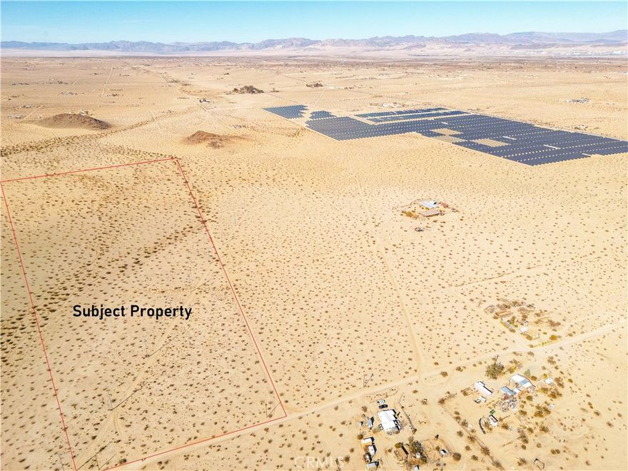 This exceptional 40-acre lot in western 29 Palms offers a rare opportunity to own prime real estate just minutes from the Joshua Tree border. Ideally located near paved roads (Lear Ave and Hwy 62), the property provides easy access while maintaining a peaceful, secluded atmosphere. With water and electricity services nearby and 3-phase electric poles crossing the southern boundary, it’s ready for development. The land is nearby some charming ranch homes making this land a great opportunity for farmland and offers stunning views of Copper Mountain to the west. Located just minutes from the Indian Cove entrance to Joshua Tree National Park, and with city water lines within 600 feet (buyer to verify), this property holds incredible potential for creating your dream home or a serene getaway making this a fantastic opportunity you won't want to miss!