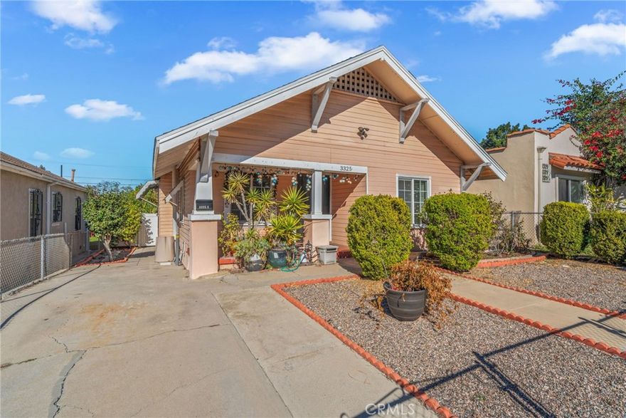 This classic Craftsman duplex sits on a 5,600 sq ft lot, offering superior flexibility for owner-occupants and investors. Totaling 1,532 sq ft, the property features two private, well-laid-out units: The 2-bed/2-bath front home with a detached one-car garage and California basement. The 1-bed/1-bath rear home includes its own separate gated parking, entrance, and storage unit.   
Original architectural details and a welcoming covered porch retain the home's charm, recent upgrades include, mini-split HVAC systems in the front home, & dedicated indoor laundry area. Both homes offer generous room sizes, ample kitchen storage, and comfortable bathrooms.   
The expansive rear yard has mature fruit trees, concrete patio area, and significant space for entertaining or gardening. Additional features: detached 1 car garage, California basement under the 2 bedroom home, and a storage shed for the back unit.