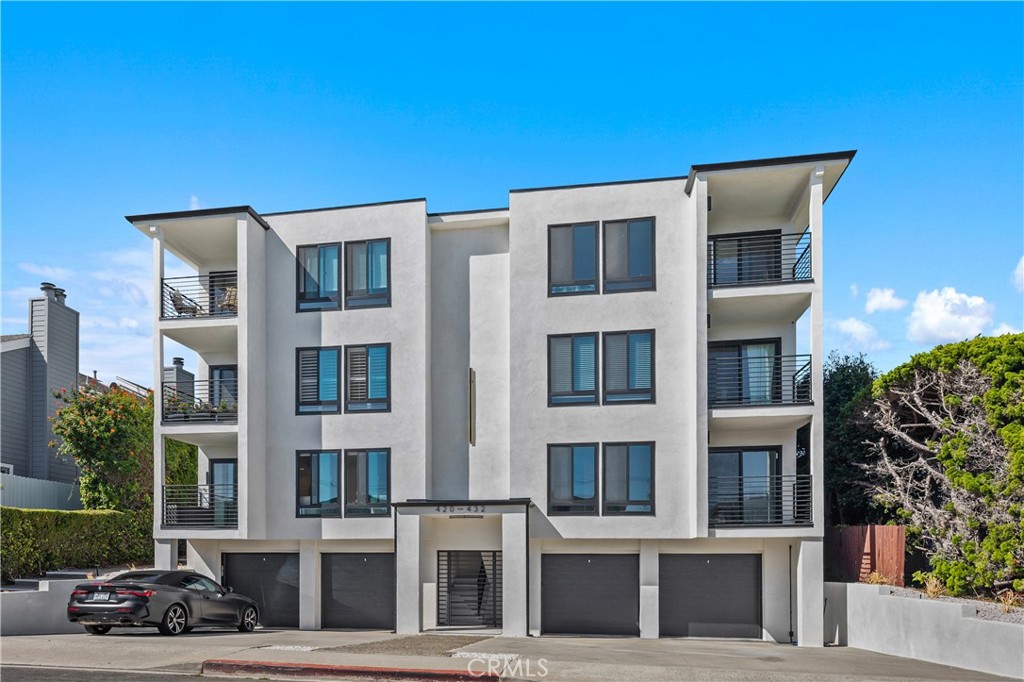 Located on the top floor of a three story "like new" north Laguna Beach condominium building, which underwent a "top to bottom" thorough remodel. This condo's location enables vast, unobstructed, panoramic, ocean and hills views...of Catalina Island, the Dana Point Headlands, and the tree covered Laguna Beach hillsides. Large windows offer privacy and ventilation. (There are virtually no privacy issues because the neighboring buildings are lower in height.)
Some of the interior walls of this condo have been removed or modified to create a wonderful "great room" effect. The well designed and functional "home office" features a built-in desk and filing cabinets...ideal for working at home. Light hardwood floors throughout, an oversized gas fireplace, ventilation skylights in the two bathrooms, multiple cedar lined closets, in-unit stackable washer and dryer, front and rear outdoor balconies, a one-car garage next to the building's front door, and a separate lockable storage room on the ground floor of the rear building. The owner did an extensive and thorough remodel and redesign when creating this amazing top floor condominium! It truly is the best condo in the building!
