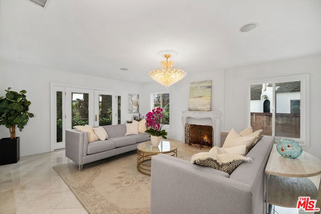 Welcome to Casa Kilkea! A beautifully remodeled single-story sanctuary designed with family living in mind. Nestled on a spacious corner lot and surrounded by lush greenery, this private 4-bedroom residence offers the perfect blend of comfort, style, and convenience. Step inside to discover a bright, open floor plan where expansive living, family, and dining areas flow effortlessly into a stunning, newly renovated kitchen. At the heart of the kitchen, a striking grand marble island complements top-of-the-line appliances including a Sub-Zero refrigerator, ideal for everyday living and effortless entertaining . Additional highlights include a detached 2-car garage with automatic side entry and central A/C for year-round comfort.Located in a warm, welcoming neighborhood close to shops, dining, Houses of Worship, and more, Casa Kilkea is where privacy meets community .Public Records show the property as 2bedrooms/2bath , Buyers to verify. This is more than a home it's your personal haven in the heart of it all.