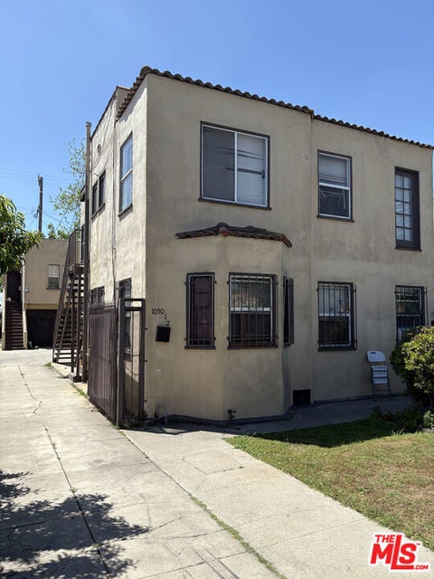 Photo of 1052 W 60th Place, Los Angeles, CA 90044 (MLS # 26799892)