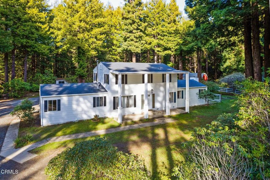 Motivated Seller!  Enjoying end of road privacy, this Colonial style home is nestled among majestic redwood groves on 3.85 +/- acres. The 3 bedrooms are upstairs with a full bath and an additional half bath for convenience. Downstairs is a centrally located kitchen perched above the large family room that served as a gathering and entertainment area for guests. On the other side of the kitchen is a smaller sitting area near the fireplace which is a perfect place to relax in front of the fire with a book.  The formal dining area is just off the sitting area and convenient to the kitchen for dinner parties. There is an additional full bathroom downstairs and a pantry. The attached 2 car garage has ample room. Moving to the back of the house, there is a redwood deck that has a brick barbecue built in for outdoor entertaining. A detached studio could be used for many creative needs such as a hobby room or art studio. Bring your animals, The barn has hay storage above, a stall below with a feed chute, a workshop space and an overhang off the back to park or store more items out of the weather. The main water well on the property produces most of the water you will need but there is a backup well also. The property itself is mostly level and gentle land; with a little effort someone could turn this property into a park like setting or repurpose some of the land into other uses that may be desired. Many varieties of rhododendrons have been planted and are now mature and spectacular in the springtime. The home has been well-loved over the years and is just waiting for someone to come in and put their touches in place. With a sunbelt location, the property can be in the sunshine on some foggy days while it's proximity to the coast means that it also receives coastal influence which is well received when the temperatures get hot inland. Fort Bragg and its essential services are close at hand for convenience along with the Noyo Harbor, State Parks, beaches, coastal trails and other outdoor activities. Or, if you prefer to dine out, then return to your quiet retreat and enjoy the solitude of this beautiful setting.  The owner is willing to carry for a short term with a large down payment.  Ask your agent about the credit the seller is offering towards the new flooring of your choice!