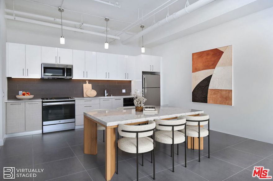 Incredible Airbnb investment opportunity in the heart of DTLA! Situated in DTLA's Historic Theatre District beside the Ace Hotel, this fully renovated 2-bedroom, 1-bath condominium combines industrial-chic design with preserved architectural charm. Spanning over 1,220 sqft, the open layout features 11-ft ceilings, porcelain tile floors, and original windows that bathe the space in natural light. Modern upgrades include a Nest thermostat, remote-controlled blackout blinds, and a custom master closet. The kitchen boasts quartz countertops, stainless steel appliances, and ample storage, blending style with functionality. Residents enjoy premium amenities such as a rooftop pool/spa with sweeping city views, cabanas, a gym, and in-unit laundry. The building supports residential, rental, Airbnb, and live/work options, with 24-hour security for added peace of mind. Steps from the Apple flagship store, Whole Foods, and renowned dining, this home offers the perfect balance of historic character, modern luxury, and unbeatable convenience in the heart of Los Angeles.situ