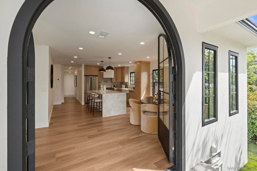 Discover the charm of this beautifully renovated single-story home in the heart of Coronado. This residence offers three bedrooms, two bathrooms, and a spacious two-car garage, along with a brand-new roof, energy-efficient windows, a designer kitchen, and tastefully remodeled bathrooms. Professionally curated finishes and meticulously landscaped grounds create a warm, inviting atmosphere, while the outdoor barbecue area makes entertaining a breeze. Ideally located just a short walk from local schools and all that Coronado has to offer, this property blends comfort, style, and the ultimate island lifestyle.