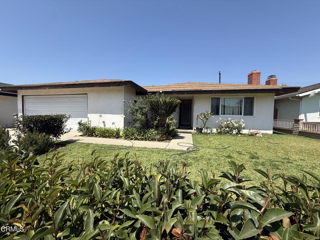 Welcome to 1421 Kingswood Way in North Oxnard! This home is being sold as-is and offers a wonderful opportunity to remodel and create the home you've been dreaming of. With a nice, functional floor plan, the property is full of potential and ready for your personal touch.Inside, you'll find a spacious living room with a cozy fireplace, perfect for family gatherings. The kitchen opens to a large dining area with sliding door access to the backyard, making it great for entertaining. The attached two-car garage provides convenience and plenty of storage.Featuring four bedrooms, this home provides ample space for family, guests, or a home office. While it is dated, the layout and bones are strong, giving you a solid foundation to bring your ideas to life.Located in desirable North Oxnard, you'll love the proximity to schools, parks, shopping centers, grocery stores, and more--all just minutes away.Don't miss this chance to turn a well-located house into your dream home!