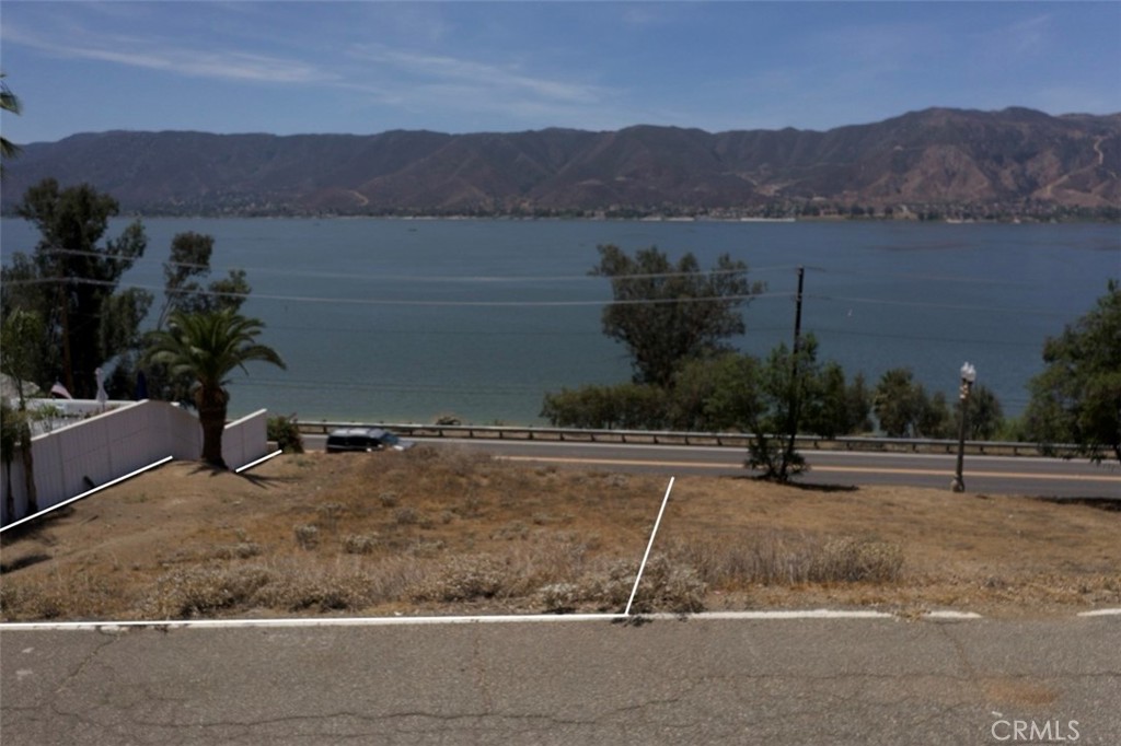 Incredible Lake View Opportunity in Country Club Heights!
This is your chance to grab two side-by-side lots (APNs 375-205-014 & 375-205-015) totaling 4,792 sq ft, perched above Lake Elsinore with stunning views of the lake and Ortega Mountains. Whether you're looking to build your own weekend retreat or invest in a fast-growing area, this spot checks all the boxes. Utilities are available at the street, and you’re just minutes from the water—fishing, boating, and all the outdoor fun Lake Elsinore is known for. Super convenient location near Riverside Dr. (Hwy 74) and Lakeshore Dr., close to the newly updated Historic Main Street with great shops and dining. Also near the Lake Elsinore Outlets and tons of new commercial development. Easy access to the 15 freeway makes this an ideal location for commuters, investors, or weekenders.