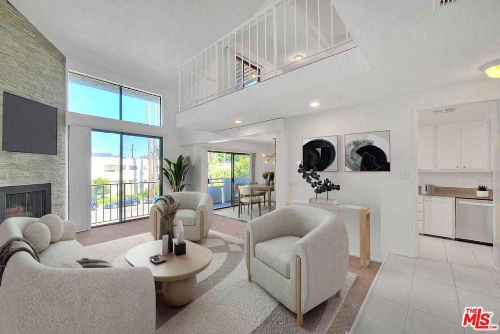 Discover your dream home in Studio City! This top-floor corner unit offers 1,771 sqft of bright and spacious living space, featuring two primary suites, two bathrooms, plus a large loft. Enjoy four balconies, high ceilings, and a cozy fireplace. The unit comes with a wet bar, two covered parking spaces, and ample storage. Central air ensures year-round comfort, and laundry facilities are conveniently located in the building. Located a short distance from Ventura Blvd, this is a must-see opportunity for those seeking a vibrant urban lifestyle in the heart of Studio City!