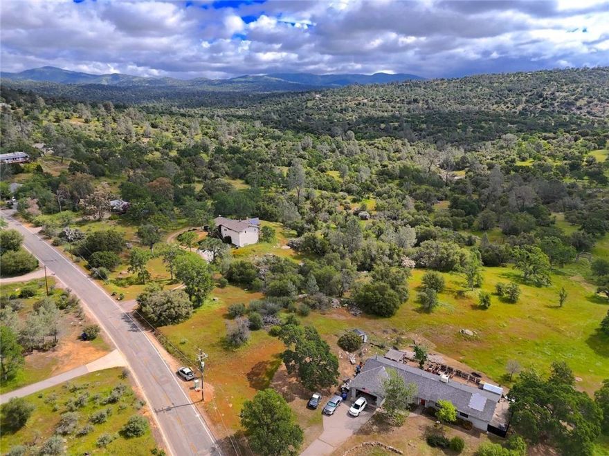 Embrace mountain living on this 1.15-acre lot in Coarsegold, Madera County. This Residential-zoned land is ready for your dream home or a manufactured/mobile home, with city water and overhead electricity at the lot line, and plenty of space to build. Set at 1490 feet elevation, enjoy the scenic views and convenient asphalt road access. The property is part of an HOA, ensuring a well-maintained community. With a clear title and low yearly taxes of $265, this is your chance to build a serene mountain retreat.