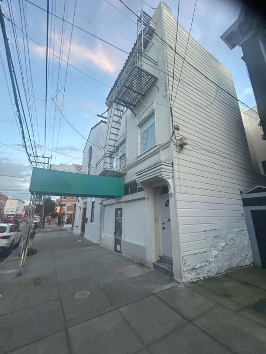 Welcome to this expansive 8-bedroom mixed use property located in the vibrant city of San Francisco. Work ,live and play lifestyle. First floor can be an office /retail or  a coffee shop with indoor and outdoor setting or seating area.With a generous 3,432 sq ft of living space, this property offers a versatile layout perfect for large families or those looking for ample room to grow. The kitchen is equipped with an electric cooktop and other countertop surfaces, seamlessly connecting to a combined family room for a modern open-plan living experience. The dining area is conveniently situated within the living room, enhancing the ease of entertaining.  The property features a mix of concrete, hardwood, and other flooring, adding character and durability throughout.  High ceilings add to the sense of space and grandeur. Note the absence of a cooling system, but heating is provided via baseboard and electric sources.  San Francisco Unified School District serves this location. While there is no dedicated laundry area or garage spaces, the property's ample size compensates with abundant potential. Ideal for those seeking a spacious residence in a prime urban setting.