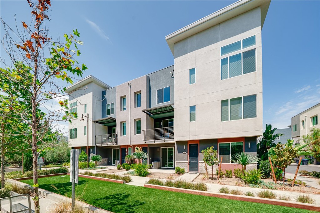 *Facing Community Greenbelt* Turn-Key home in Paseo Del Mar Community. This desired remodeled unit offers lots nature light in living space. NEW FLOORINGS with only carpet on the stairs. NEW PAINTS. 1st Floor has open space and it is ideal for office or entertainment area. 2nd Floor are included delight kitchen with white shaker cabinetries, center island, walk-in pantry, back splash, stainless steel appliances that overlooks the Great Room. Covered deck is perfect to enjoy the community greenbelt at any time. Convenience guest powder room. Top floors are Master Suite with Walk-In Closet, Dual Sinks and Shower Area, two spacious bedroom, hallway bathroom and laundry area. Direct access to 2-car garage with EV charger. Enjoy community amenities. CONVIENT LOCATIONS, close to Diamond Jamboree Plaza, Walmart Supercenter and HWY 5/55/405.