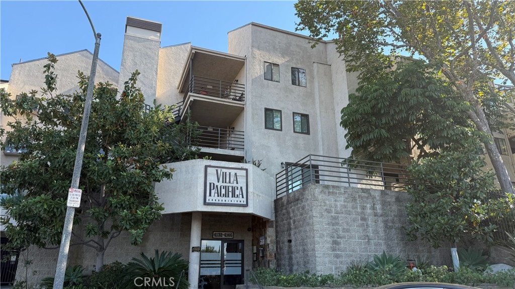 Modern Coastal Living with Soaring Ceilings & Versatile Loft!
Welcome to this exquisite and rare top-floor corner condo in the highly desirable Villa Pacifica community of Long Beach. Offering approximately 1,400 sq ft of beautifully designed living space — plus an additional 140 sq ft of finished flex space (ideal for a home office, guest room, or creative retreat) - this spacious 2-bedroom, 2-bathroom residence combines modern luxury with smart functionality.
Step inside to discover vaulted ceilings, abundant natural light, and a flowing open-concept layout. The updated kitchen is a chef’s dream, featuring granite countertops, a custom tile backsplash, stainless steel appliances, bar seating, and a large island breakfast bar—perfect for both everyday meals and entertaining.
The kitchen opens to a cozy living room complete with a sliding glass door that leads to a balcony—the perfect spot for morning coffee or evening sunsets. The primary suite features generous closet space and a private en-suite bathroom, while the second bedroom and full bath provide comfort for guests or family. Upstairs, the spacious loft and finished attic space offer flexible living options to suit your lifestyle. A bonus is the mountain views from your private unfinished roof top deck accessed from the loft through a sliding glass door and a pet door.
Luxury Features:
• In-unit laundry (washer & dryer included)
• Recessed lighting
• Central air & heat
• Dry bar with dual wine/beverage fridges
• Vaulted ceilings & large windows
• Private balcony with treetop views
• Cedar line closets
Building & HOA Amenities:
• Sparkling pool & spa
• Beautifully landscaped courtyards and green spaces
• Secure gated entry
• Gated, controlled access garage with 2 assigned parking spaces
• Private storage locker and bicycle storage
• Elevator access and stairwells
• Water, trash, and sewer are included in your HOA dues.
Ideally located in East Long Beach, close to Cal State Long Beach, parks, shopping, dining, and freeway access, this condo offers a perfect balance of comfort, convenience, and lifestyle. Whether you're entertaining, working from home, or looking for a peaceful retreat, this home truly has it all.