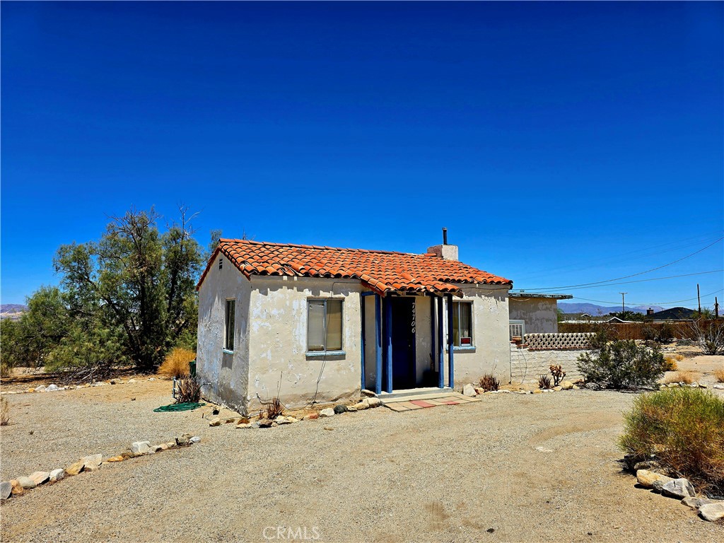 Charming Vintage Spanish-Style Starter Home Near Joshua Tree National Park!
Discover this delightful 2-bedroom, 1-bathroom Spanish-style gem just minutes from Joshua Tree National Park. Set on a desirable corner lot, this home boasts a classic Spanish clay tile roof, original vintage tile countertops, and timeless character throughout.
The property is ideally located close to Tortoise Rock Casino, local schools, and the Marine Base, making it a great fit for families, first-time buyers, or investors.
Don't miss this unique opportunity to own a piece of desert charm with unbeatable access to the park and surrounding amenities!