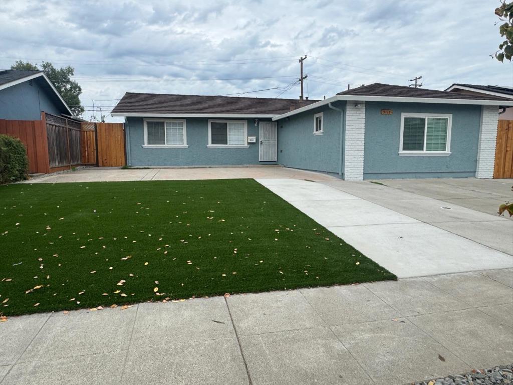Welcome to this inviting 4-bedroom, 3-bathroom home situated in the vibrant city of San Jose. Boasting 1,768 sq ft of living space, this residence offers a host of desirable features for comfortable living. The kitchen is well-equipped with quartz counter tops, a built-in oven range, both gas and electric, a dishwasher, garbage disposal. Dining is a delight with options of a breakfast bar and breakfast nook. The home features a separate family room, providing ample space for relaxation and entertainment. Enjoy the cozy ambiance of the family room. complemented by flooring that includes laminate, tiles. Modern conveniences include central AC and a wall furnace for heating. Practical elements like an outside laundry area with 220V electricity hookup add to the home's functionality. Energy-efficient double pane windows and a thermostat controller enhance sustainability. Situated in the Alum Rock Union Elementary School District, this property offers a perfect blend of comfort and practicality.