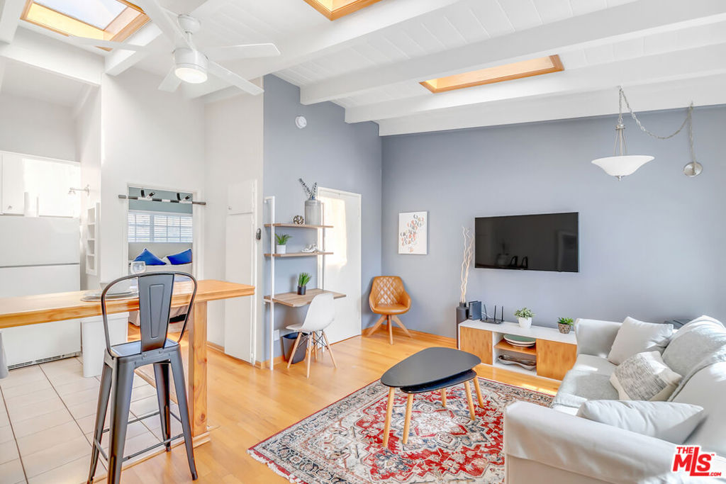 Beach vibes, but make it elevated! This stunning top-floor 1-bedroom, 1-bathroom Venice apartment is your ticket to sunlit bliss. Fully furnished (or unfurnished if that's more your style), this unit is packed with charm and ready for you to move in. Let's start with the showstoppers: vaulted ceilings and skylights that flood the space with natural light, making every day feel brighter. Add in gorgeous hardwood floors, a dreamy king bed, and a comfy pull-out sofa, and you've got the ultimate retreat for beachside relaxation. Oh, and don't forget the 2 TVs -- along with utilities, because stress-free living is the name of the game. Perched in a prime Venice location, you're just a short walk to the iconic Venice Beach Boardwalk and the sandy shores of the Pacific. When you're ready to explore, Abbot Kinney's famous shops, restaurants, and cafes are just around the corner. Whether you're a sun-chaser, a foodie, or just someone who loves vaulted ceilings (who doesn't?), this place has you written all over it. Skylights, style, and space it's all here! Don't wait to snag this top-floor Venice treasure. Call us today and make it your own piece of paradise.