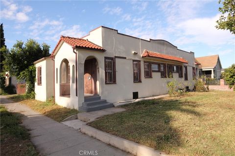 Photo of 3959 S St Andrews PL, Los Angeles, CA 90062 (MLS # PW26097481)