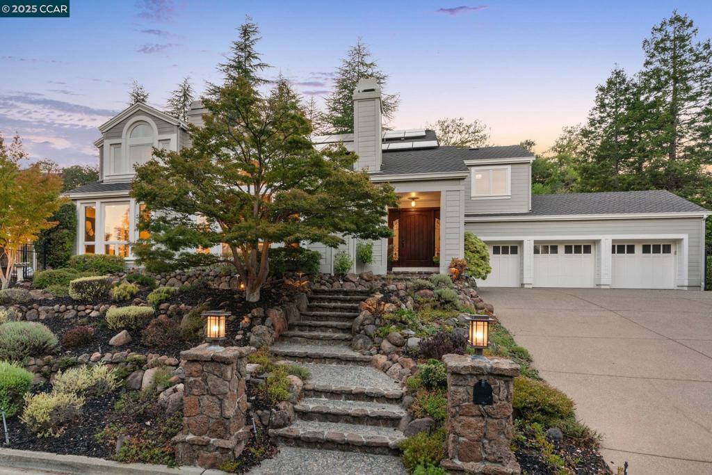 Tucked within Lafayette’s coveted Greenhills neighborhood, 3238 Greenhills Drive offers the perfect blend of space, comfort, and resort-style living. Built in 1988 among just 35 residences, this expansive 4,799± sq. ft. home features 5 bedrooms plus an office, 4.5 bathrooms, and rests on a serene .67-acre lot. A welcoming entry with vaulted ceilings and a sweeping staircase leads to formal living and dining rooms, an all-season room, and a chef’s kitchen with premium finishes, sleek cabinetry, and an oversized island that flows into a casual dining nook and inviting family room. The upstairs primary retreat boasts lofty ceilings, solar-powered skylight blinds, a bonus office with fireplace, and a spa-inspired bath with heated floors and steam shower. Two en-suite bedrooms, two additional bedrooms, and a hidden bonus space offer flexibility for family or guests. The backyard is a private oasis with a sparkling pool, spa, waterfall, built-in BBQ, fire pit, pergola, and multiple lounge areas. Additional highlights include a three-car garage, functional mudroom, owned solar, solar pool heating, updated finishes, and fresh landscaping—all just minutes from downtown Lafayette, BART, top-rated schools, and commuter routes.