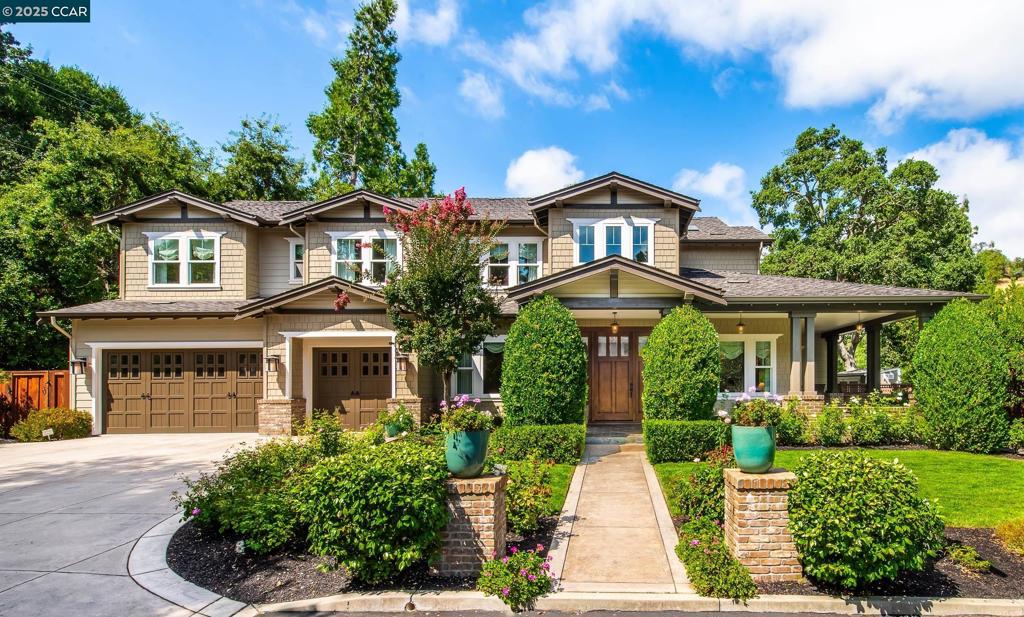 Open Sat & Sun from 1-4pm! Experience resort-style living in this immaculately maintained Lafayette retreat, where serenity, sophistication, and everyday luxury converge. A dramatic entry opens to a formal living room, elegant dining room with butler’s pantry, and a 250+ bottle wine cellar. The chef’s kitchen features a large center island with bar seating, stainless steel appliances, dual sinks, and walk-in pantry, seamlessly flowing to the informal dining area and expansive family room. The main level also offers a private guest suite, full bath, powder room, and mudroom. Upstairs includes a secondary family room, three bedrooms, two baths, and a luxurious primary retreat with a spa-inspired bath and dream walk-in closet. Additional highlights include a large laundry room and an oversized four-car garage with a second laundry and extensive storage. Outside, enjoy a PebbleTec pool and spa with waterfalls and ledge seating, expansive paver patio, a gas firepit beneath string lights, and a fully equipped outdoor kitchen with bar seating, prep sink, BBQ, and fridge. Lush gardens, level lawns, a tranquil pond, planter-box windows, and a welcoming front porch complete this cul-de-sac sanctuary. Just moments from Briones trails, scenic walking paths, and top-rated Lafayette schools!