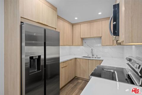 Photo of 2449 N Beachwood Drive #13, Los Angeles, CA 90068 (MLS # 26648531)