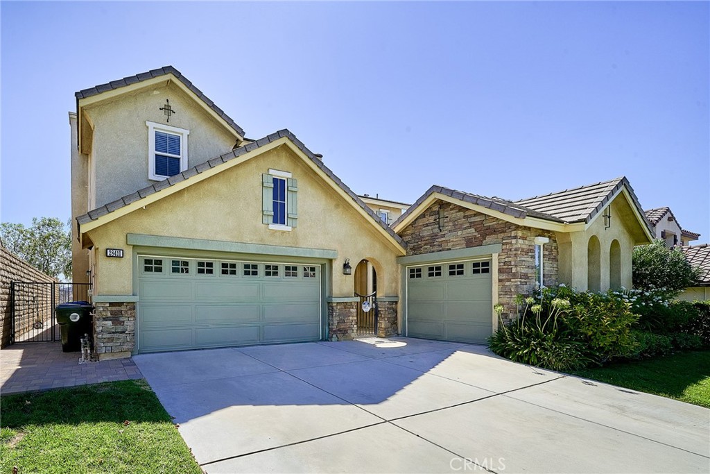 SUPER CLEAN. Stunning 4 Bedroom+1 Loft, with Mountain Views & Exceptional Layout. Welcome to your dream home in the esteemed Estrella Vista community of Santa Clarita! This meticulously maintained 3,011 sq. ft. residence is situated just north of Copperhill Drive in one of the most peaceful, safe, and sought-after neighborhoods. Built in 2002, this gem of a home offers an incredibly attractive and functional floor plan. Enjoy engineered hardwood floors in common areas, new carpeting in all bedrooms, and custom paint and molding throughout—including crown molding in the living room and dining room, window casings and chair rail details, and upgraded bathroom faucets.
The gated front entry offers enhanced security and an enclosed private space. As you enter the home, you’ll be greeted by high ceilings, a beautiful staircase, and a spacious tiled foyer. Adjacent to the grand entry, there is a formal living and dining area, with lots of windows for abundant natural light. The kitchen, featuring upgraded appliances and an island with a breakfast bar for two, flows seamlessly into the bright family dining area and family room —complete with a clean fireplace and splendid mountain views. The main level also includes one bedroom, one full bathroom, and a laundry room with a utility sink. Storage space is plentiful throughout the home, including a walk-in storage under the staircase and custom built-in cabinets in the family room and garage entry.
Upstairs, you’ll find some of the largest secondary bedrooms in the neighborhood, plus a massive loft with cabinetry—ideal as a media room, play area, or home office. The upstairs A/C was upgraded just four years ago! The primary suite is a must-see, enhanced with a private sitting area and a custom built-in closet in addition to a big walk-in closet. Outside, mature trees, paver stones, and beautifully framed mountain vistas create a serene backdrop for entertaining or relaxing. There is no swimming pool or backyard lawn, so low maintenance landscaping will save water and electricity costs significantly.
Just minutes away from scenic parks! With a 3-car garage, no Mello-Roos, low HOA, and close proximity to Copperhill Drive for easy access to shopping, dining, and commuting, this residence checks every box. Don’t miss this rare opportunity to own a move-in ready home in one of Santa Clarita’s most coveted neighborhoods. Schedule your private tour today!