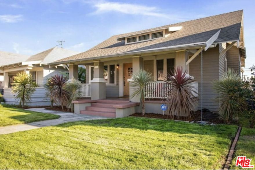 Beautifully remodeled Craftsman Bungalow! Located in West Adams / Jefferson Park HPOZ! The main house has 3 beds and 2 baths and was extensively renovated in 2017, yet it still maintains elements of its original charm. Features include: hardwood floors; a beautiful leaded-glass built-in cabinet in the dining room; an open concept kitchen with custom cabinets, a large center island and quartz countertops; and a master bedroom suite with a luxurious master bath and a large walk-in master closet. Behind the scenes we have reverse-osmosis water filters, all new window treatments, and the foundation has been fully retrofitted. Enjoy your morning coffee or afternoon aperitif on the expansive rear deck overlooking your private, gated driveway, lush landscaping. Surrounded by towering lush palms.