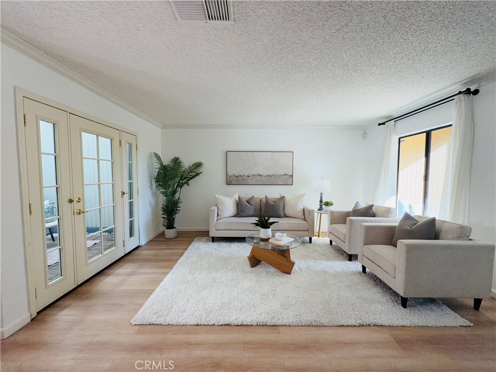 Welcome to 1044 Kent Drive, a tastefully updated and well-maintained townhome offering comfort, convenience, and a vibrant community setting. This charming residence features 3 spacious bedrooms and 2.5 bathrooms, perfectly designed for modern living.
Step inside to a bright and inviting living room centered around a cozy fireplace, seamlessly connecting to a private patio through elegant French doors — ideal for entertaining or relaxing outdoors. The primary suite boasts vaulted ceilings, an en-suite bathroom, and ample natural light, creating a peaceful retreat. Two additional bedrooms provide versatility for family, guests, or a home office.
Enjoy the convenience of a direct-access two-car garage and two outdoor patios that extend your living space. The well-kept community offers lush landscaped grounds, a gated pool and spa, clubhouse, and RV parking. The HOA covers hot water, trash, landscaping, and community amenities, ensuring a low-maintenance lifestyle.
Located in a desirable San Dimas neighborhood, this home provides easy access to major freeways (210, 57, and 10), shopping, dining, and top-rated schools including San Dimas High School and Lone Hill Middle School.
Experience the best of comfort and convenience in this move-in-ready townhome — a true gem in the heart of San Dimas.