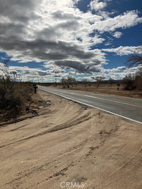 Share a property line with the famous Integratron and across the road from the world renowned Gubblers Orchids in Landers California! This is one of the last large parcels available on Landers up and coming Belfield Blvd. This 44.75 Ac lot has multiple options for use and development. At the base of goat Mountain, electricity is already to the lot and water is very close. Incredible desert and mountain views, multiple roads have access; Belfield Blvd is paved. Come and see the opportunities that await!