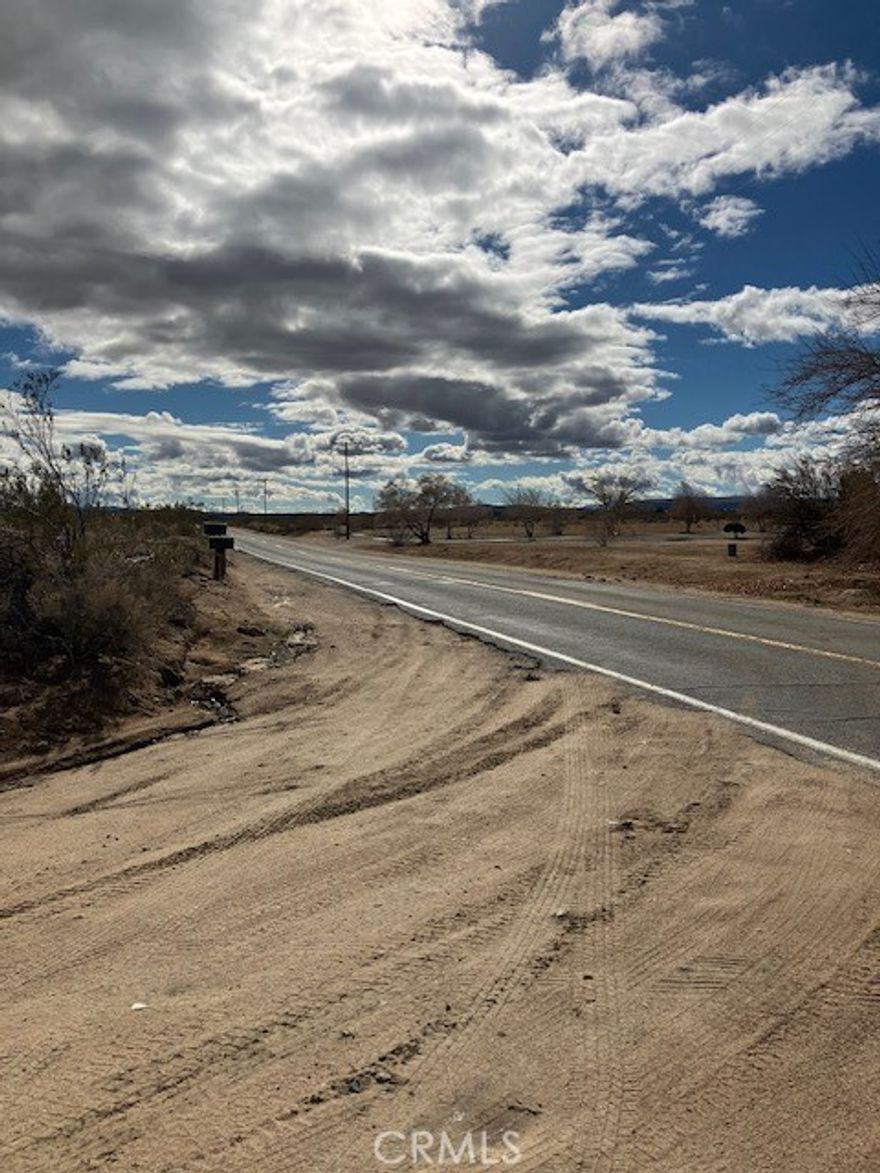Share a property line with the famous Integratron and across the road from the world renowned Gubblers Orchids in Landers California! This is one of the last large parcels available on Landers up and coming Belfield Blvd. This 44.75 Ac lot has multiple options for use and development. At the base of goat Mountain, electricity is already to the lot and water is very close. Incredible desert and mountain views, multiple roads have access; Belfield Blvd is paved. Come and see the opportunities that await!