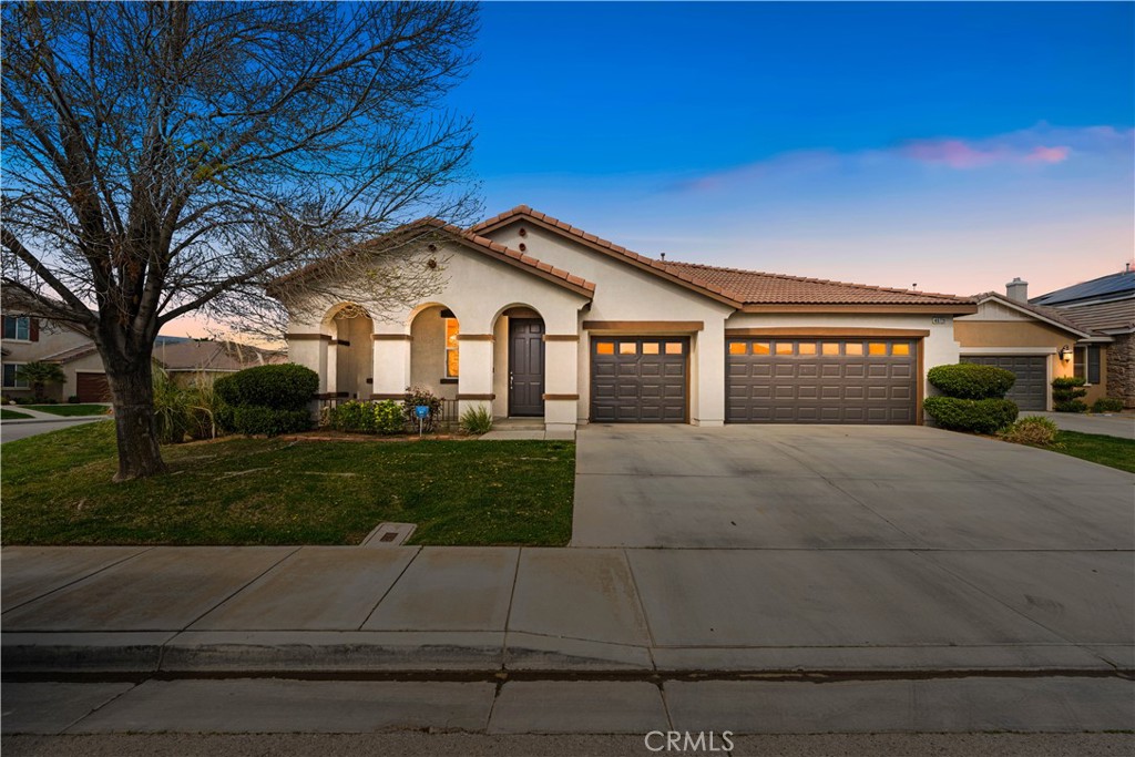 Sophisticated Single-Story Sanctuary in Rancho Vista
Welcome to this exquisite 2,684 square foot residence nestled in the desirable Rancho Vista community. This meticulously maintained four-bedroom, three-bathroom home offers a thoughtfully designed single-story floor plan that provides both openness and privacy for all occupants.
The intelligent layout creates distinct wings throughout the home, ensuring tranquility and personal space. Upon entry, you'll discover a private bedroom with its dedicated bathroom—an ideal arrangement for guests, in-laws, or older children seeking independence. The remaining bedrooms are situated near the primary suite, creating a harmonious sleeping quarters arrangement.
Natural light cascades through the home, illuminating the carefully crafted interior spaces. The gourmet kitchen stands as the heart of this residence, featuring a practical double oven, abundant counter space for culinary creativity, and generous storage solutions for all your kitchenware and pantry needs.
Step outside to discover an expansive backyard—a blank canvas awaiting your personal touch, whether that means entertaining spaces, gardening endeavors, or recreational areas for the entire family.
This property enjoys an enviable location just minutes from the prestigious Rancho Vista Golf Course, with Rancho Vista Park less than a mile away for outdoor recreation. Education options abound with Paraclete High School in the vicinity.
The home presents in move-in condition, allowing you to simply unpack and begin creating memories in your new Rancho Vista residence. Don't miss the opportunity to secure this single-story gem in one of Palmdale's most coveted neighborhoods.