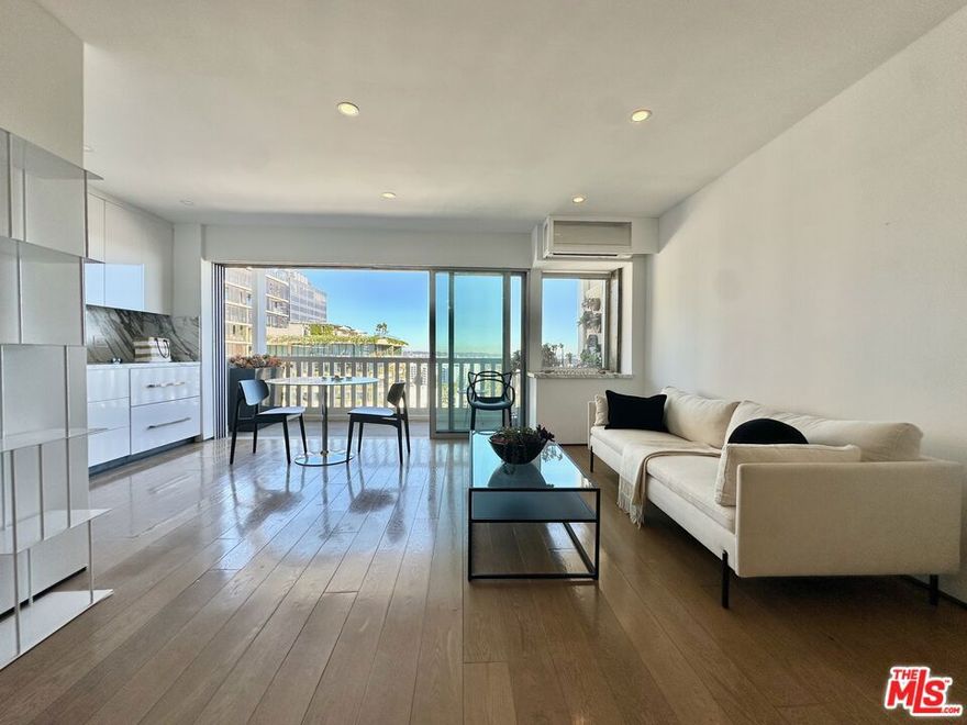 This stunning Five Star  pied a Terre is  vacant and also available immediately for lease.  A floor to ceiling total renovation includes blonde wide plank oak flooring, custom lighting, imported Calacatta stone work and a pristine expanded bath.  Sub Zero refrigerator, Bosch appliances, custom lacquered touch cabinetry are features of a pristine open and airy floor plan extending to the 16 ft+ corner entertainer's balcony.   Double paned stacking doors seamlessly slide  to the spectacular expansive 180 degree views to glorious sunrises and dazzling nighttime city lights.   Reside steps to Beverly Hills, the finest & most popular restaurants, clubs and the new Edition Hotel.    A Swimmer's Salt water pool, gym, spa, sauna, valet and 24-hour  concierge. Please call for further details. Available now!!  View virtual tour link