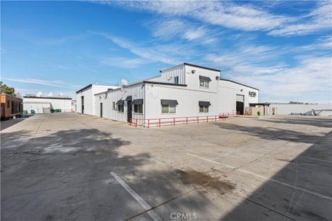 Photo of 9332 Holly Road, Adelanto, CA 92301 (MLS # HD26143404)