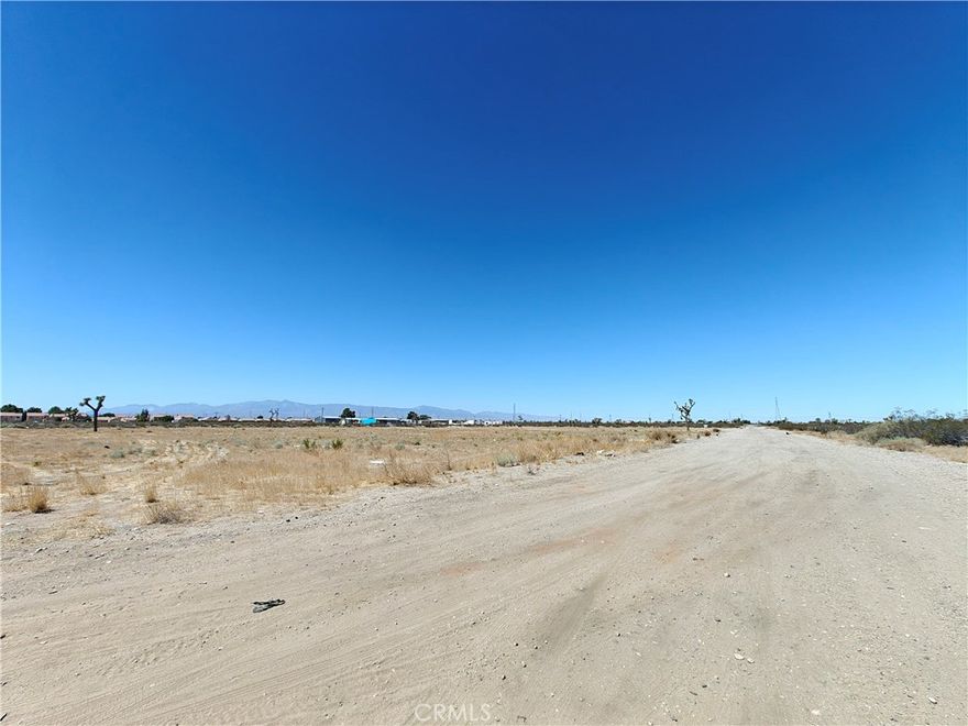 2.73 Acres in Adelanto. Cross streets of Auburn Ave and Aster Rd. Copy and paste in search bar HHV6+6WG Adelanto, California or paste the gps coordinates 34°35'35.0"N 117°26'15.6"W  You'll find this lot is in the vicinity of tract homes. It's appealing in it's potential and outlook.