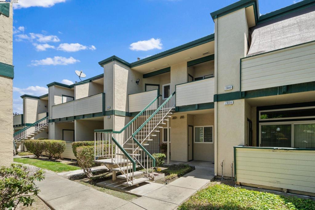 Please follow the residents car in the right side gate if you don't have code. Located in a gated community with resort-style amenities including a pool, spa, basketball court, and picnic/BBQ areas, this updated top-floor condo offers comfort, style, and convenience. Featuring vaulted ceilings, fresh paint, new laminate flooring that beautifully resembles hardwood, and modern light fixtures throughout. The bright and spacious interior includes stainless steel appliances, an in-unit washer and dryer, updated bathrooms, and a private balcony overlooking the pool. Comes with two parking spaces (one covered, one uncovered) and ample guest parking. Low monthly HOA fees. Enjoy unbeatable walkability to Union Landing Plaza, home to 70+ shops, restaurants, and entertainment options. With easy access to highways 880, 92, the Dumbarton Bridge, and BART, this is truly commuter-friendly. Welcome home to Sugar Springs in Union City!